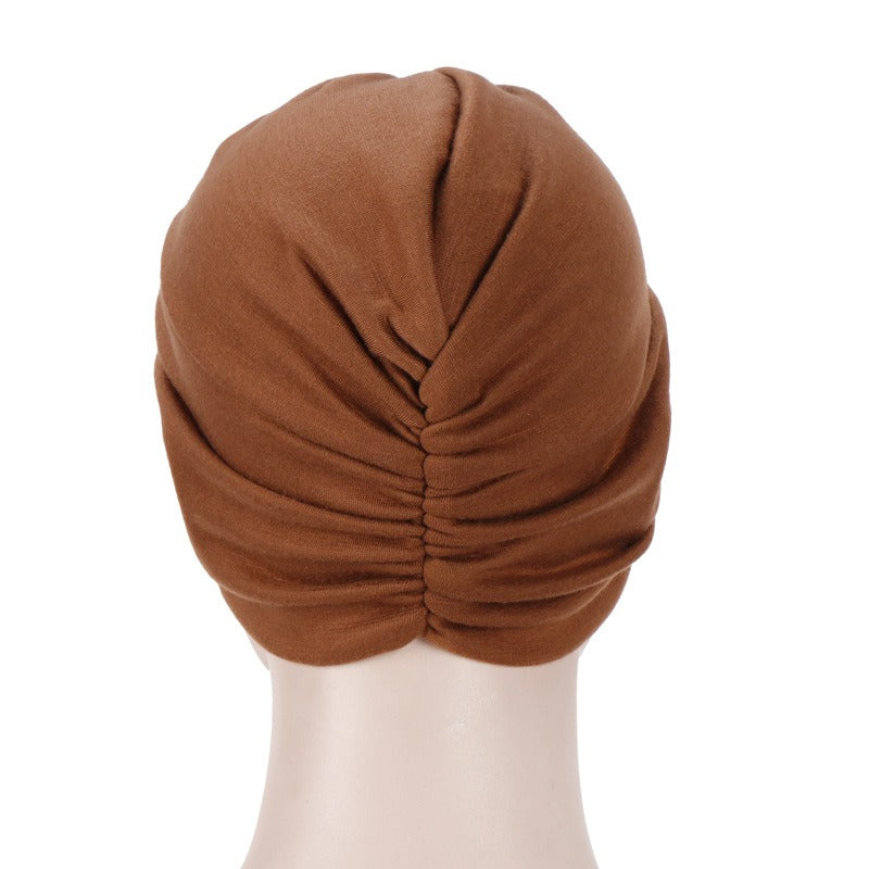 New elastic fabric with crossed candy colored twisted hat and candy colored base on the forehead V.I.P Digital Presence