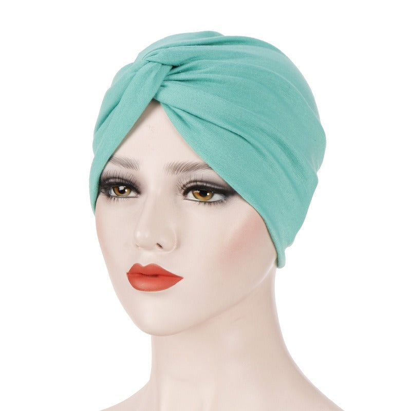 New elastic fabric with crossed candy colored twisted hat and candy colored base on the forehead V.I.P Digital Presence