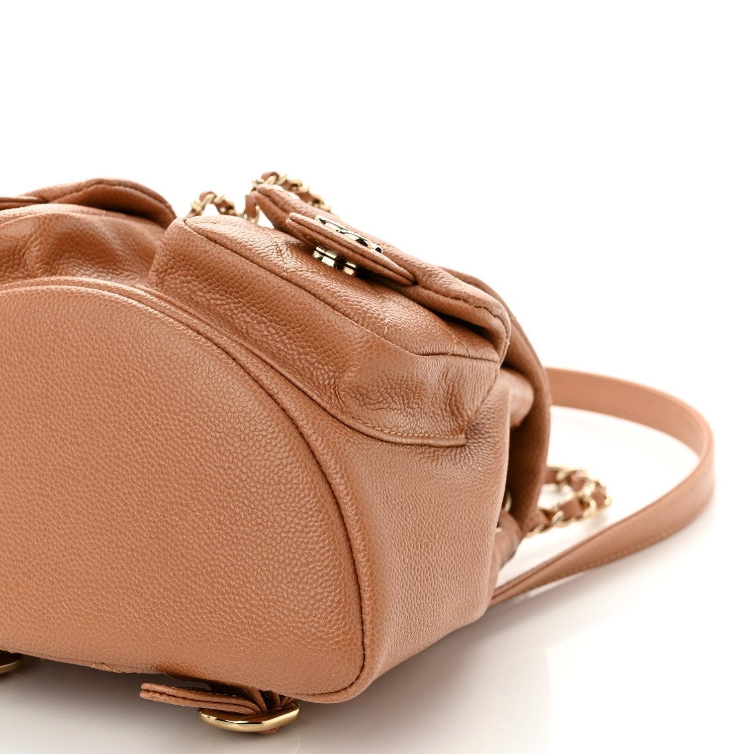 Chanel Shiny Caviar Quilted Small Duma Pockets Drawstring Backpack