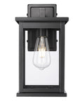 11"H Bowton II Outdoor Wall Light - Dusk to Dawn Matte Black Finish with Glass Shade by Millennium Lighting LampsUSA