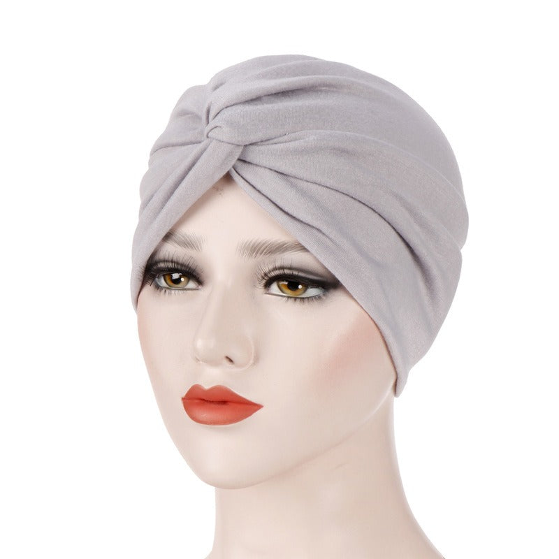 New elastic fabric with crossed candy colored twisted hat and candy colored base on the forehead V.I.P Digital Presence