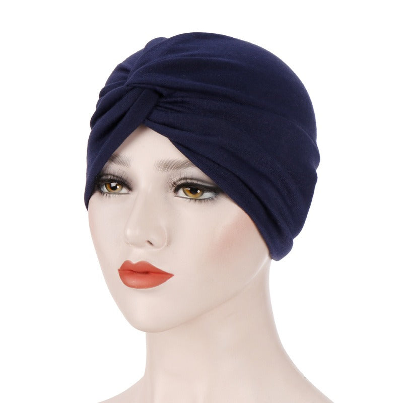 New elastic fabric with crossed candy colored twisted hat and candy colored base on the forehead V.I.P Digital Presence