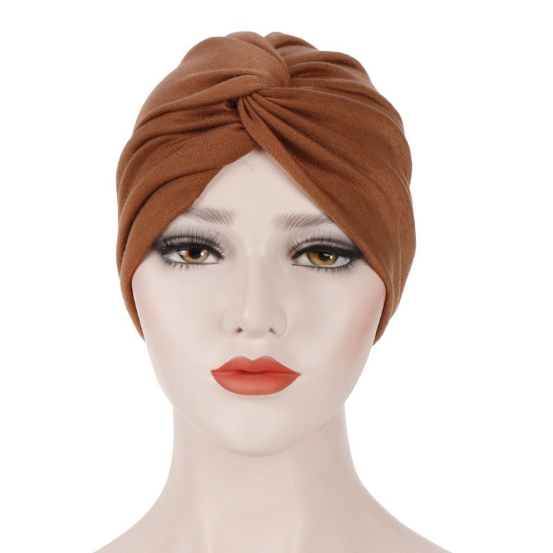 New elastic fabric with crossed candy colored twisted hat and candy colored base on the forehead V.I.P Digital Presence