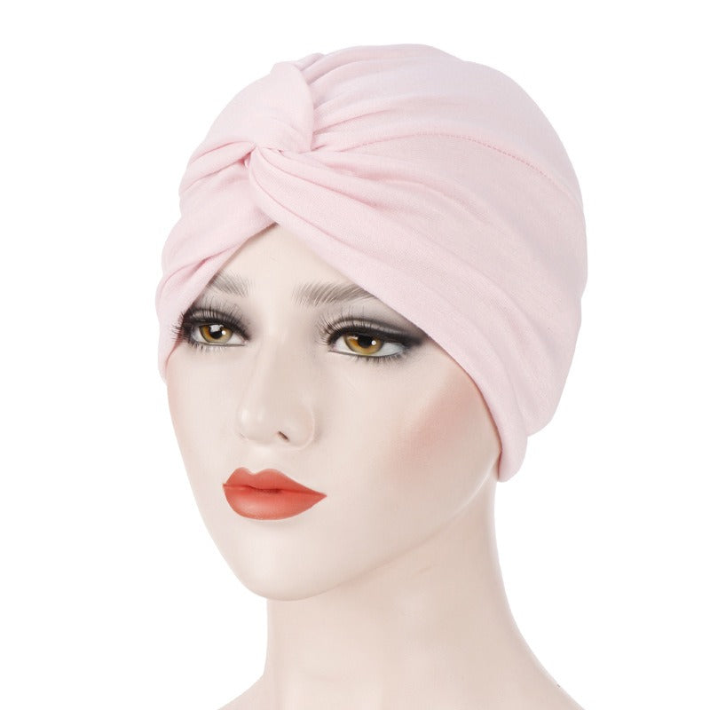 New elastic fabric with crossed candy colored twisted hat and candy colored base on the forehead V.I.P Digital Presence