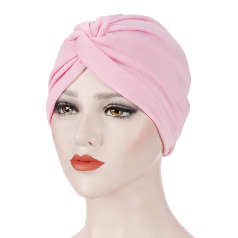New elastic fabric with crossed candy colored twisted hat and candy colored base on the forehead V.I.P Digital Presence