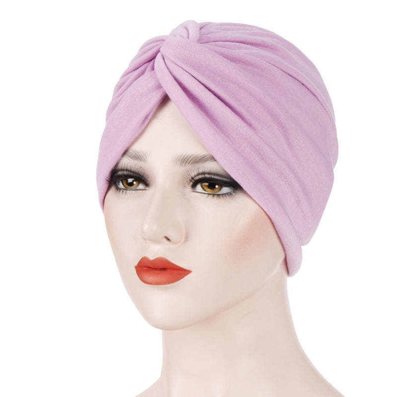 New elastic fabric with crossed candy colored twisted hat and candy colored base on the forehead V.I.P Digital Presence