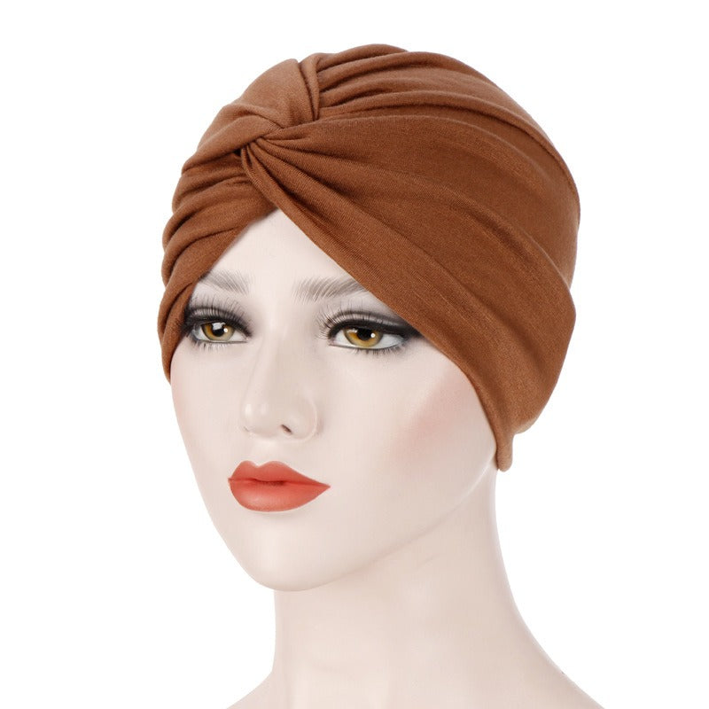 New elastic fabric with crossed candy colored twisted hat and candy colored base on the forehead V.I.P Digital Presence