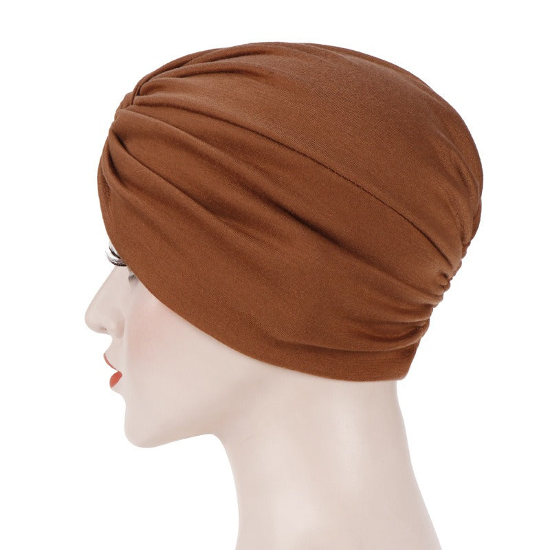 New elastic fabric with crossed candy colored twisted hat and candy colored base on the forehead V.I.P Digital Presence