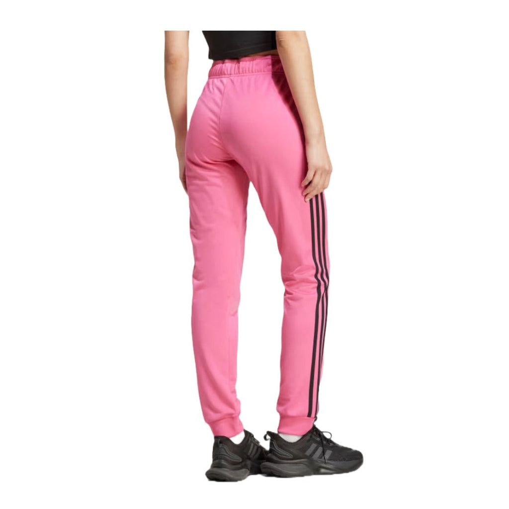 adidas Women's Primegreen Essentials Warm-Up Slim Tapered 3-Stripies Track Pants - Pulse Magenta runnwalk