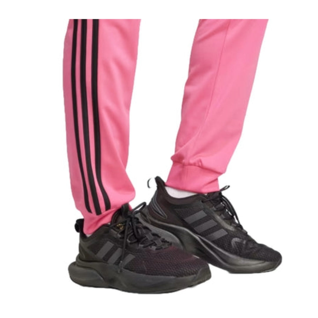 adidas Women's Primegreen Essentials Warm-Up Slim Tapered 3-Stripies Track Pants - Pulse Magenta runnwalk