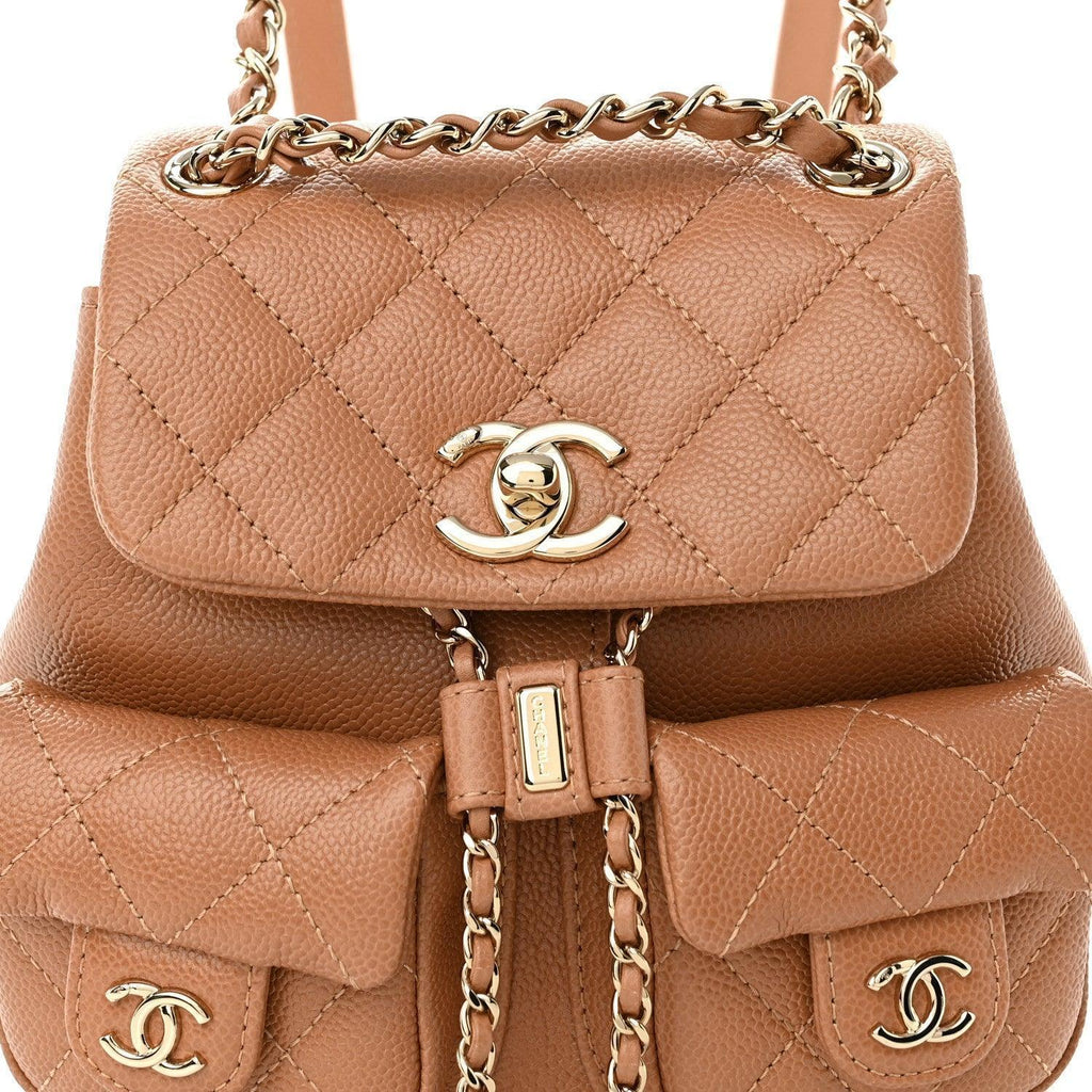 Chanel Shiny Caviar Quilted Small Duma Pockets Drawstring Backpack