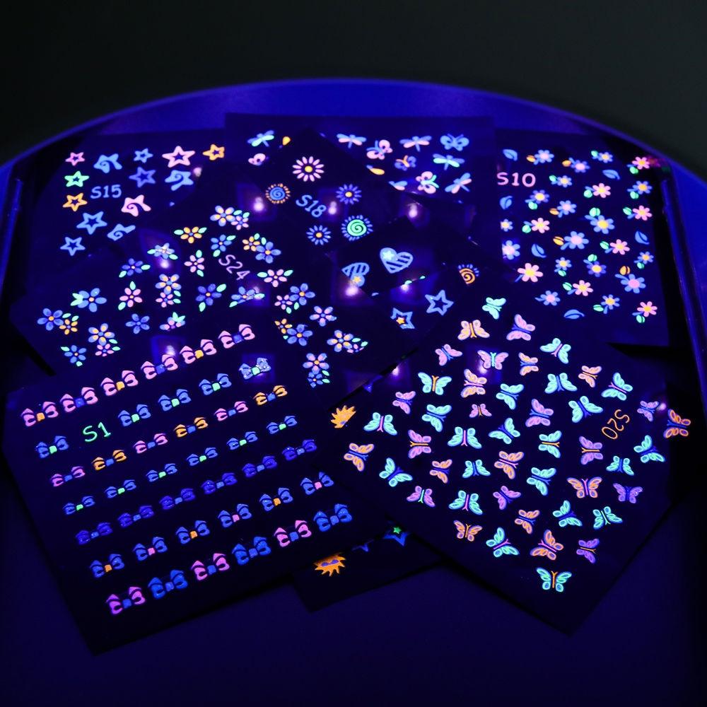 Fluorescent Flowers Nail Stickers Party Butterfly Night Glow Star Decoration Manicure Applique Sliders For Nails Design Fluorescent Light Flame Butterfly Moon Love Pattern Designs Nail Decal Decoration Tips For Beauty Salons Glow in Dark Nail Stickers