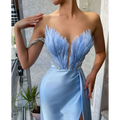White Satin Gown with Feathers Sweeping the Floor